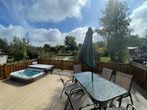 Luxury Lakeside Lodge L1 with hot tub situated at Tattershall Lakes Country Park